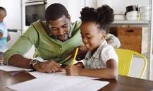 Father and Daughter doing homework