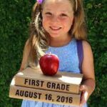 little girl ready to start the 1irst Grade.